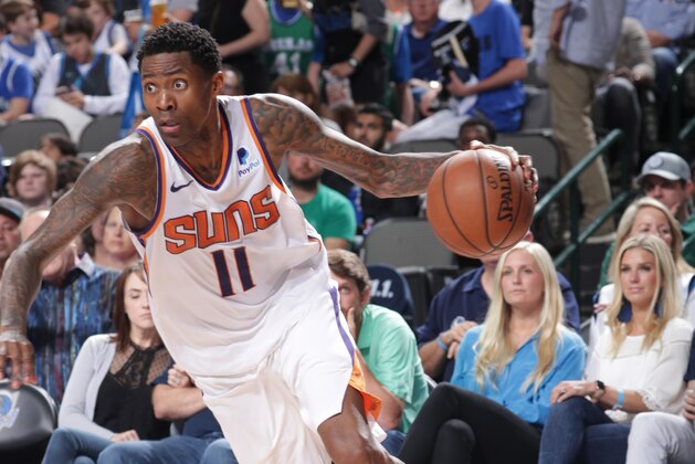 DALLAS, TX - APRIL 9: Jamal Crawford #11 of the Phoenix Suns handles the ball against the Dallas Mavericks on April 9, 2019 at the American Airlines Center in Dallas, Texas. NOTE TO USER: User expressly acknowledges and agrees that, by downloading and or using this photograph, User is consenting to the terms and conditions of the Getty Images License Agreement. Mandatory Copyright Notice: Copyright 2019 NBAE (Photo by Glenn James/NBAE via Getty Images)