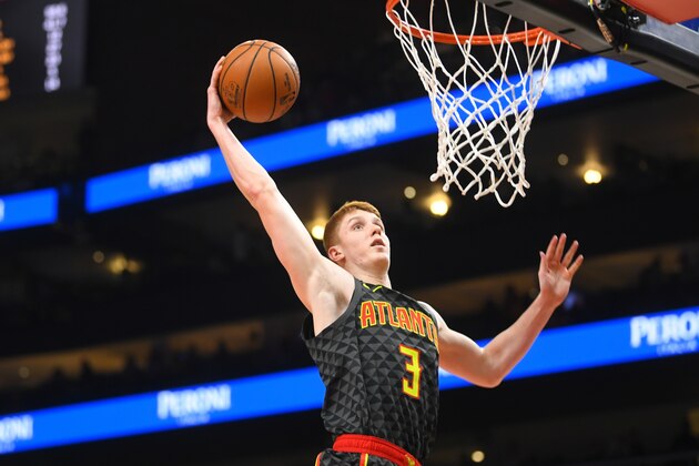 Atlanta Hawks guard Kevin Huerter goes up to dunk during an NBA basketball game against the Orlando Magic, Wednesday, Feb. 26, 2020, in Atlanta. (AP Photo/John Amis)