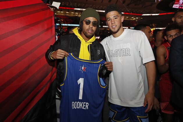 CHICAGO, IL - FEBRUARY 16: Devin Booker #2 of Team LeBron poses for a photo with D'Angelo Russell #0 of the Minnesota Timberwolves during the 69th NBA All-Star Game as part of 2020 NBA All-Star Weekend on February 16, 2020 at United Center in Chicago, Illinois. NOTE TO USER: User expressly acknowledges and agrees that, by downloading and/or using this Photograph, user is consenting to the terms and conditions of the Getty Images License Agreement. Mandatory Copyright Notice: Copyright 2020 NBAE (Photo by Kamil Krzaczynski/NBAE via Getty Images)