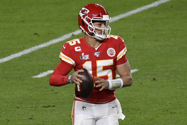 MIAMI, FLORIDA - FEBRUARY 02: Patrick Mahomes #15 of the Kansas City Chiefs looks to pass against the San Francisco 49ers in Super Bowl LIV at Hard Rock Stadium on February 02, 2020 in Miami, Florida. The Chiefs won the game 31-20. (Photo by Focus on Sport/Getty Images)