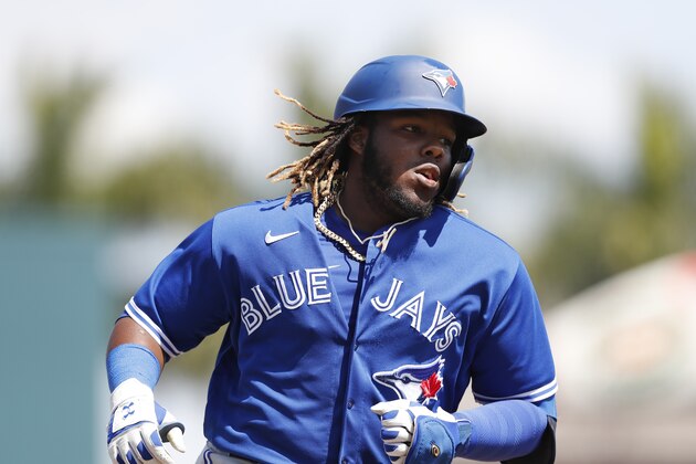 Toronto Blue Jays' Vladimir Guerrero Jr. rounds the bases after a solo home run during a spring training baseball game against the Pittsburgh Pirates, Thursday, March 12, 2020, in Bradenton, Fla. (AP Photo/Carlos Osorio)