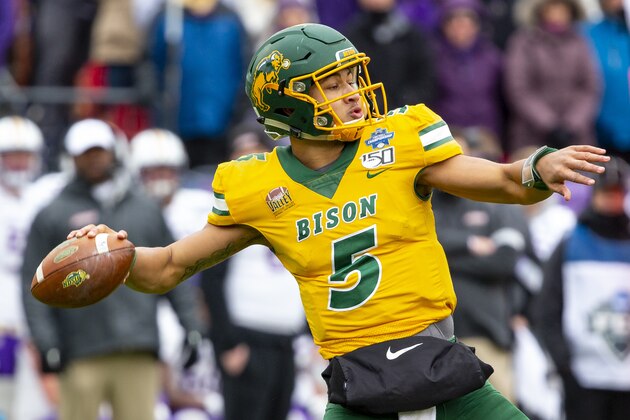 North Dakota State quarterback Trey Lance (5) winds up to throw during the first half of the FCS championship NCAA college football game against James Madison, Saturday, Jan. 11, 2020, in Frisco, Texas. (AP Photo/Sam Hodde)