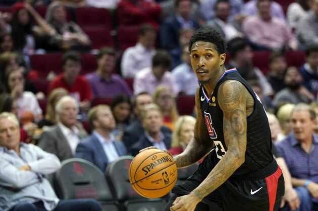 Los Angeles Clippers' Lou Williams (23) drives toward the basket against the Houston Rockets during the first half of an NBA basketball game Thursday, March 5, 2020, in Houston. (AP Photo/David J. Phillip)