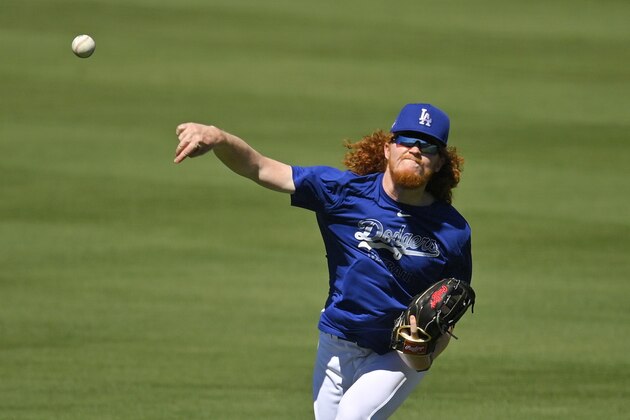 Los Angeles Dodgers starting pitcher Dustin May warms up during the restart of spring training Friday, July 3, 2020, in Los Angeles. (AP Photo/Mark J. Terrill) Los Angeles Dodgers starting pitcher Dustin May warms up during the restart of spring training Friday, July 3, 2020, in Los Angeles. (AP Photo/Mark J. Terrill)