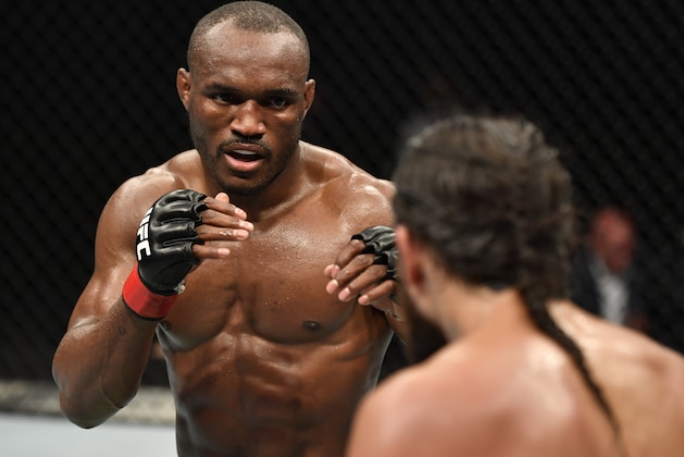 ABU DHABI, UNITED ARAB EMIRATES - JULY 12: (L-R) Kamaru Usman of Nigeria battles Jorge Masvidal in their UFC welterweight championship fight during the UFC 251 event at Flash Forum on UFC Fight Island on July 12, 2020 on Yas Island, Abu Dhabi, United Arab Emirates. (Photo by Jeff Bottari/Zuffa LLC)
