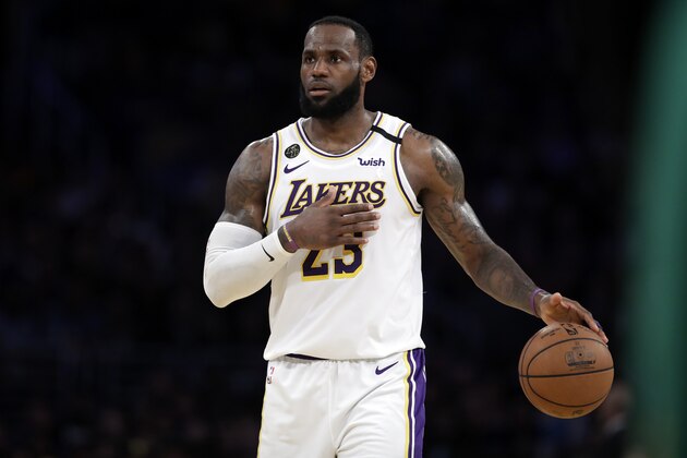 Los Angeles Lakers' LeBron James (23) dribbles during the second half of an NBA basketball game against the Boston Celtics Sunday, Feb. 23, 2020, in Los Angeles. (AP Photo/Marcio Jose Sanchez)