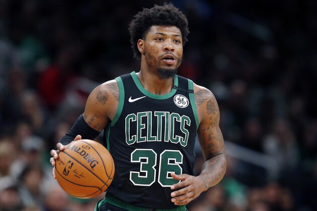Boston Celtics' Marcus Smart plays against the Houston Rockets during an NBA basketball game in Boston, Saturday, Feb. 29, 2020. (AP Photo/Michael Dwyer) Boston Celtics' Marcus Smart plays against the Houston Rockets during an NBA basketball game in Boston, Saturday, Feb. 29, 2020. (AP Photo/Michael Dwyer)