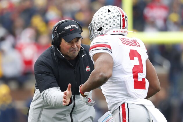Ohio State head coach Ryan Day congratulates Ohio State running back J.K. Dobbins after his touchdown against Michigan in the first half of an NCAA college football game in Ann Arbor, Mich., Saturday, Nov. 30, 2019. (AP Photo/Paul Sancya) Ohio State head coach Ryan Day congratulates Ohio State running back J.K. Dobbins after his touchdown against Michigan in the first half of an NCAA college football game in Ann Arbor, Mich., Saturday, Nov. 30, 2019. (AP Photo/Paul Sancya)