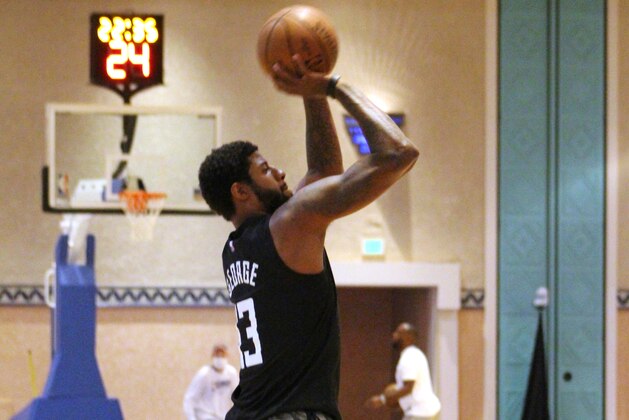 ORLANDO, FL - JULY 11: Paul George of the LA Clippers shoots during practice as part of the NBA Restart 2020 on July 11, 2020 in Orlando, Florida. NOTE TO USER: User expressly acknowledges and agrees that, by downloading and/or using this photograph, user is consenting to the terms and conditions of the Getty Images License Agreement. Mandatory Copyright Notice: Copyright 2020 NBAE (Photo by Madison Quisenberry/NBAE via Getty Images) ORLANDO, FL - JULY 11: Paul George of the LA Clippers shoots during practice as part of the NBA Restart 2020 on July 11, 2020 in Orlando, Florida. NOTE TO USER: User expressly acknowledges and agrees that, by downloading and/or using this photograph, user is consenting to the terms and conditions of the Getty Images License Agreement. Mandatory Copyright Notice: Copyright 2020 NBAE (Photo by Madison Quisenberry/NBAE via Getty Images)