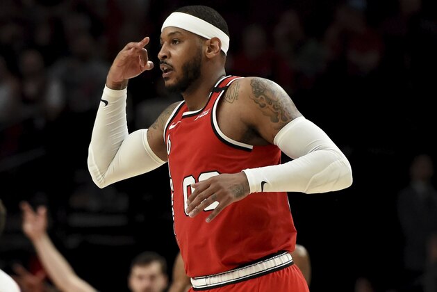 Portland Trail Blazers forward Carmelo Anthony reacts after making a shot during the second half of the team's NBA basketball game against the Phoenix Suns in Portland, Ore., Tuesday, March 10, 2020. The Blazers won 121-105. (AP Photo/Steve Dykes) Portland Trail Blazers forward Carmelo Anthony reacts after making a shot during the second half of the team's NBA basketball game against the Phoenix Suns in Portland, Ore., Tuesday, March 10, 2020. The Blazers won 121-105. (AP Photo/Steve Dykes)