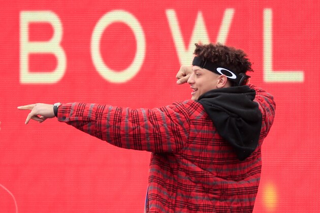 Kansas City Chiefs quarterback Patrick Mahomes celebrates during a Super Bowl parade and rally in Kansas City, Mo., Wednesday, Feb. 5, 2020. (AP Photo/Orlin Wagner)