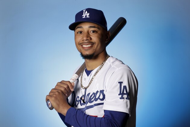 Los Angeles Dodgers outfielder Mookie Betts poses for a portrait during a spring training baseball photo day Wednesday, Feb. 19, 2020, in Phoenix. (AP Photo/Gregory Bull)