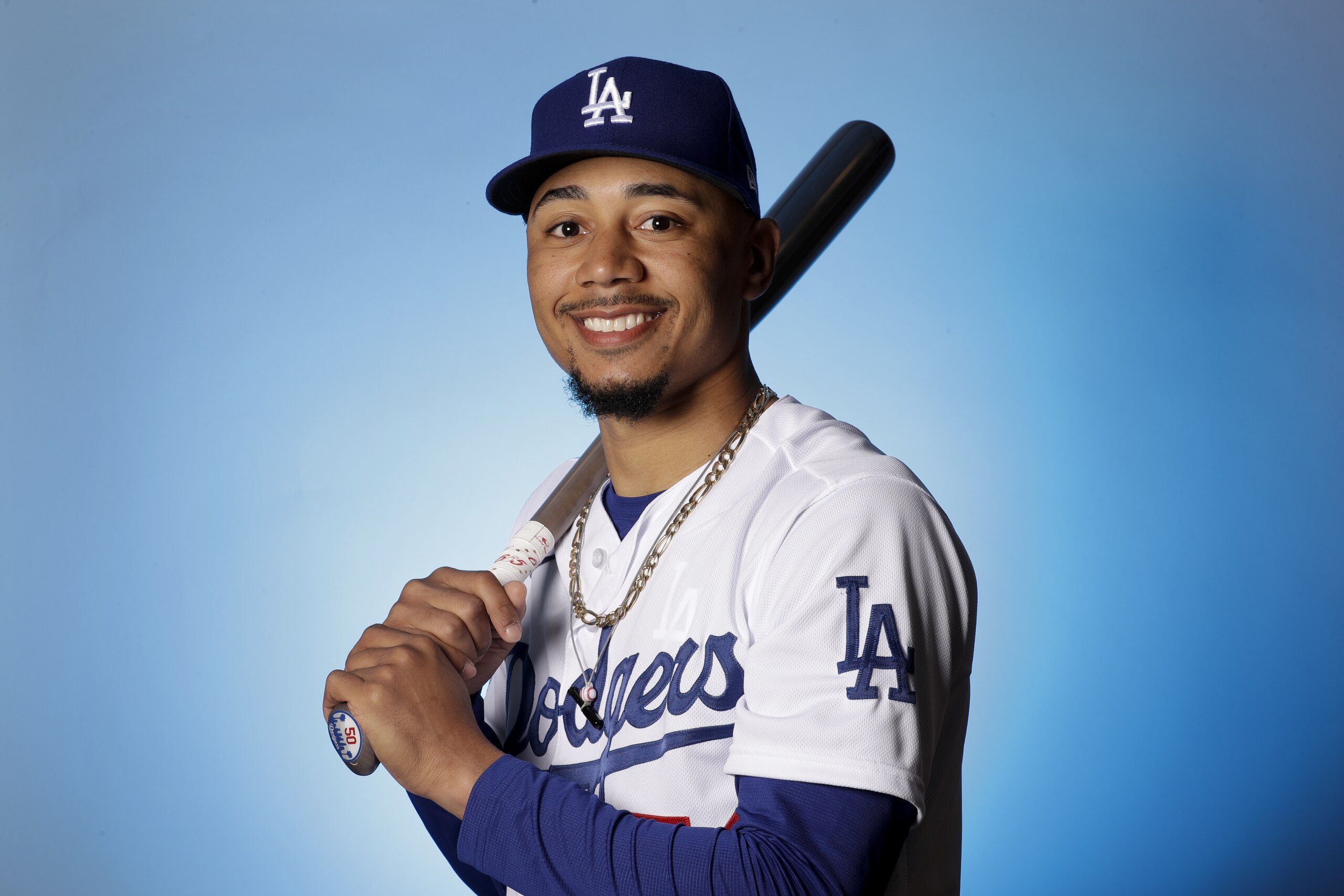 Los Angeles Dodgers outfielder Mookie Betts poses for a portrait during a spring training baseball photo day Wednesday, Feb. 19, 2020, in Phoenix. (AP Photo/Gregory Bull)