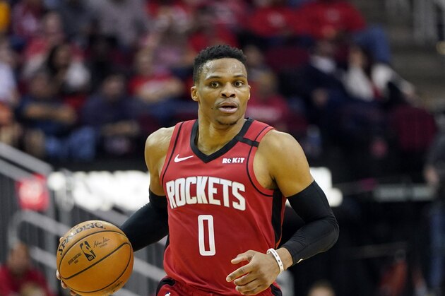 Houston Rockets' Russell Westbrook (0) brings the ball up the court against the Los Angeles Clippers during the second half of an NBA basketball game Thursday, March 5, 2020, in Houston. (AP Photo/David J. Phillip)