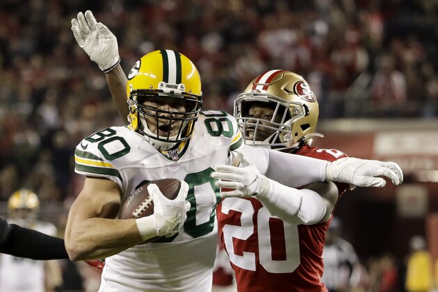 Green Bay Packers tight end Jimmy Graham runs past San Francisco 49ers free safety Jimmie Ward during the second half of the NFL NFC Championship football game Sunday, Jan. 19, 2020, in Santa Clara, Calif. (AP Photo/Marcio Jose Sanchez)