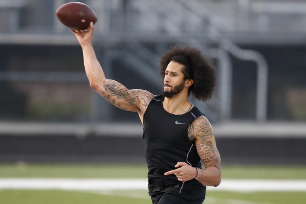 Free agent Colin Kaepernick participates in a workout for NFL football scouts and media Saturday, Nov. 16, 2019 in Riverdale, Ga. (AP Photo/Todd Kirkland)