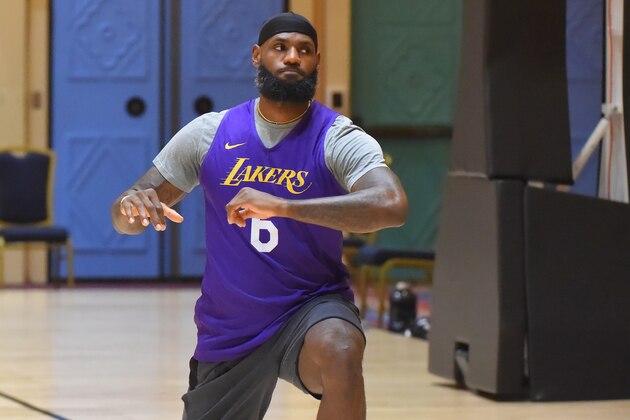 ORLANDO, FL - JULY 11: LeBron James of the Los Angeles Lakers stretches during practice as part of the NBA Restart 2020 on July 11, 2020 in Orlando, Florida. NOTE TO USER: User expressly acknowledges and agrees that, by downloading and/or using this photograph, user is consenting to the terms and conditions of the Getty Images License Agreement. Mandatory Copyright Notice: Copyright 2020 NBAE (Photo by Bill Baptist/NBAE via Getty Images) ORLANDO, FL - JULY 11: LeBron James of the Los Angeles Lakers stretches during practice as part of the NBA Restart 2020 on July 11, 2020 in Orlando, Florida. NOTE TO USER: User expressly acknowledges and agrees that, by downloading and/or using this photograph, user is consenting to the terms and conditions of the Getty Images License Agreement. Mandatory Copyright Notice: Copyright 2020 NBAE (Photo by Bill Baptist/NBAE via Getty Images)