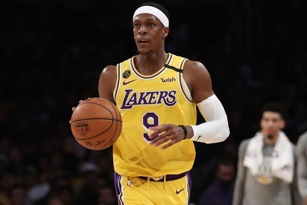 LOS ANGELES, CALIFORNIA - MARCH 03: Rajon Rondo #9 of the Los Angeles Lakers dribbles down the court in a game against the Philadelphia 76ers during the second half at Staples Center on March 03, 2020 in Los Angeles, California. NOTE TO USER: User expressly acknowledges and agrees that, by downloading and or using this Photograph, user is consenting to the terms and conditions of the Getty Images License Agreement. (Photo by Katelyn Mulcahy/Getty Images)