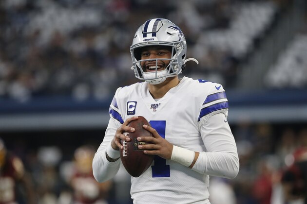Dallas Cowboys quarterback Dak Prescott (4) before an NFL football game against the Washington Redskins in Arlington, Texas, Sunday, Dec. 15, 2019. (AP Photo/Ron Jenkins) Dallas Cowboys quarterback Dak Prescott (4) before an NFL football game against the Washington Redskins in Arlington, Texas, Sunday, Dec. 15, 2019. (AP Photo/Ron Jenkins)