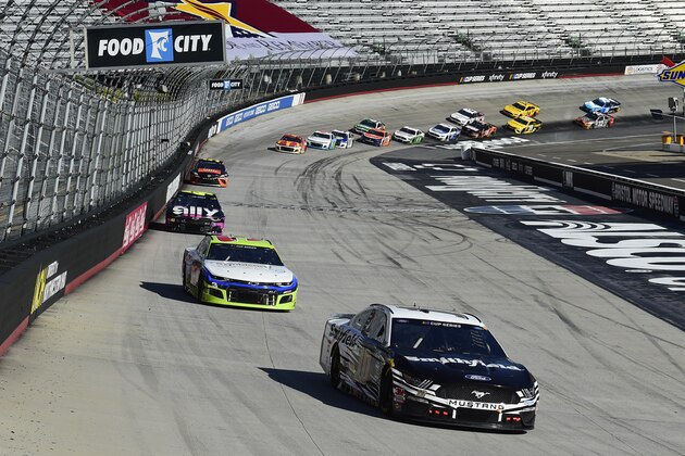 BRISTOL, TENNESSEE - MAY 31: Aric Almirola, driver of the #10 Smithfield Ford, leads a pack of cars during the NASCAR Cup Series Food City presents the Supermarket Heroes 500 at Bristol Motor Speedway on May 31, 2020 in Bristol, Tennessee. (Photo by Jared C. Tilton/Getty Images)