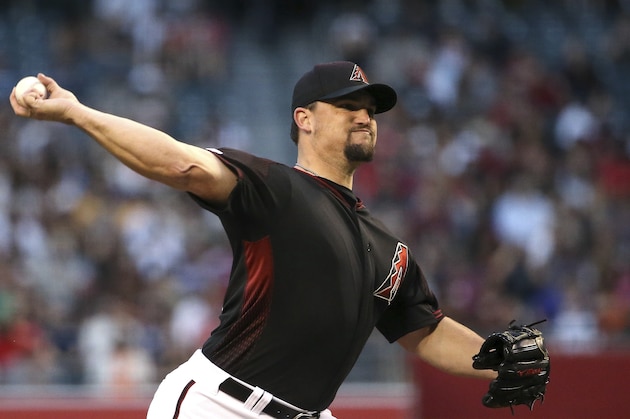 Arizona Diamondbacks starting pitcher Zack Godley throws to a San Francisco Giants batter during the first inning of a baseball game Saturday, June 22, 2019, in Phoenix. (AP Photo/Ross D. Franklin)