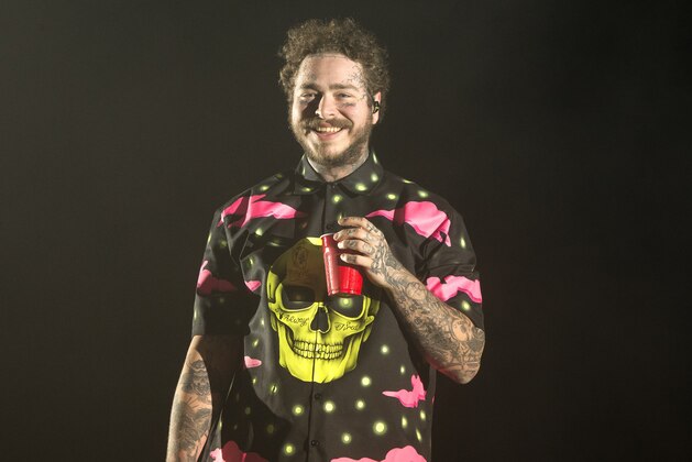 Post Malone performs on Day 3 of the 2019 Firefly Music Festival at The Woodlands on Sunday, June 23, 2019, in Dover, Del. (Photo by Owen Sweeney/Invision/AP) Post Malone performs on Day 3 of the 2019 Firefly Music Festival at The Woodlands on Sunday, June 23, 2019, in Dover, Del. (Photo by Owen Sweeney/Invision/AP)