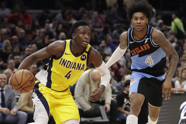 Indiana Pacers' Victor Oladipo, left, drives against Cleveland Cavaliers' Kevin Porter Jr. in the second half of an NBA basketball game, Saturday, Feb. 29, 2020, in Cleveland. Indiana won 113-104. (AP Photo/Tony Dejak)