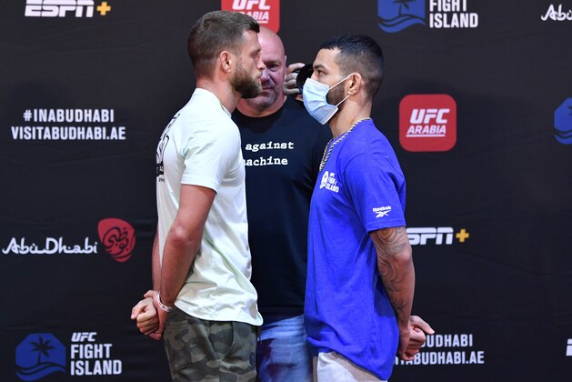 ABU DHABI, UNITED ARAB EMIRATES - JULY 14: In this handout image provided by UFC, (L-R) Opponents Calvin Kattar and Dan Ige face off during the UFC Fight Night weigh-in inside Flash Forum on UFC Fight Island on July 14, 2020 in Yas Island, Abu Dhabi, United Arab Emirates. (Photo by Jeff Bottari/Zuffa LLC via Getty Images)