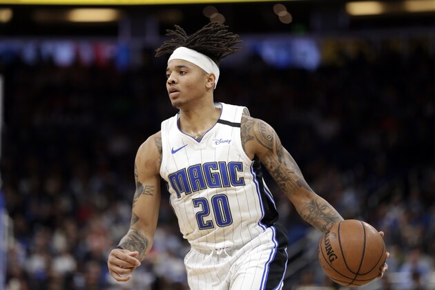 Orlando Magic guard Markelle Fultz moves the ball against the Portland Trail Blazers during the second half of an NBA basketball game, Monday, March 2, 2020, in Orlando, Fla. (AP Photo/John Raoux)