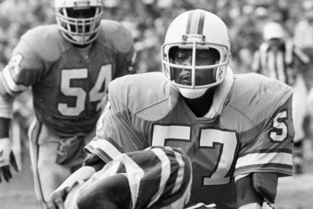 Tampa Bay Buccaneers linebacker David Lewis (57) stops Eagles running back Wilbert Montgomery during the Buccaneers 24-17 victory over the Philadelphia Eagles in the 1979 NFC Divisional Playoff Game on December 29, 1979 at Tampa Stadium in Tampa, Florida. This was the first ever playoff game in the Buccaneers history. (Photo by Hugh Jones/Getty Images) Tampa Bay Buccaneers linebacker David Lewis (57) stops Eagles running back Wilbert Montgomery during the Buccaneers 24-17 victory over the Philadelphia Eagles in the 1979 NFC Divisional Playoff Game on December 29, 1979 at Tampa Stadium in Tampa, Florida. This was the first ever playoff game in the Buccaneers history. (Photo by Hugh Jones/Getty Images)