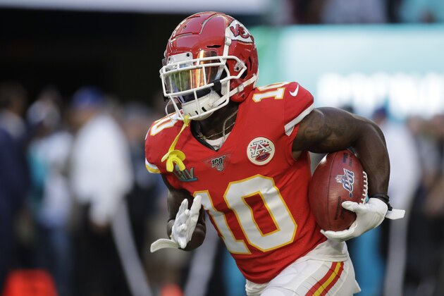 Kansas City Chiefs' Tyreek Hill (10) warms up before the NFL Super Bowl 54 football game between the San Francisco 49ers and Kansas City Chiefs Sunday, Feb. 2, 2020, in Miami Gardens, Fla. (AP Photo/Patrick Semansky)