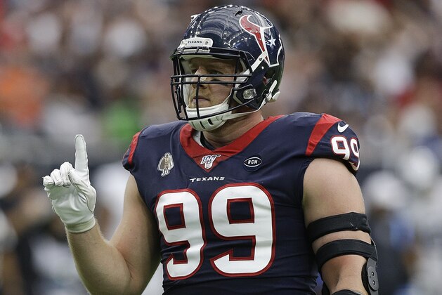 HOUSTON, TEXAS - OCTOBER 27: J.J. Watt #99 of the Houston Texans reacts after knocking down the pass attempt by Derek Carr #4 of the Oakland Raiders, not shown, in the first quarter at NRG Stadium on October 27, 2019 in Houston, Texas. (Photo by Bob Levey/Getty Images)