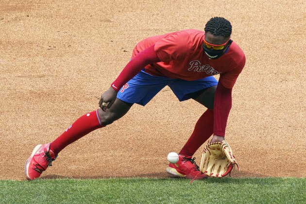 Philadelphia Phillies' Didi Gregorius does fielding drills during a baseball training session Sunday, July 5, 2020, in Philadelphia. (AP Photo/Chris Szagola)