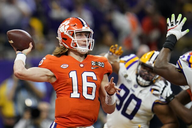 Clemson quarterback Trevor Lawrence passes against LSU during the first half of a NCAA College Football Playoff national championship game Monday, Jan. 13, 2020, in New Orleans. (AP Photo/David J. Phillip)