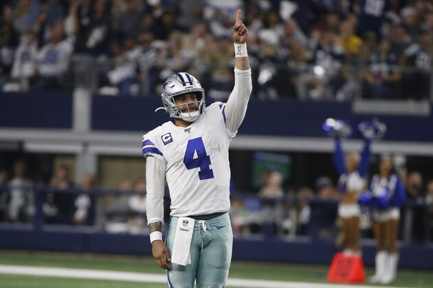 Dallas Cowboys quarterback Dak Prescott (4) celebrates a touchdown against the Washington Redskins during the second half of an NFL football game in Arlington, Texas, Sunday, Dec. 15, 2019. (AP Photo/Ron Jenkins)