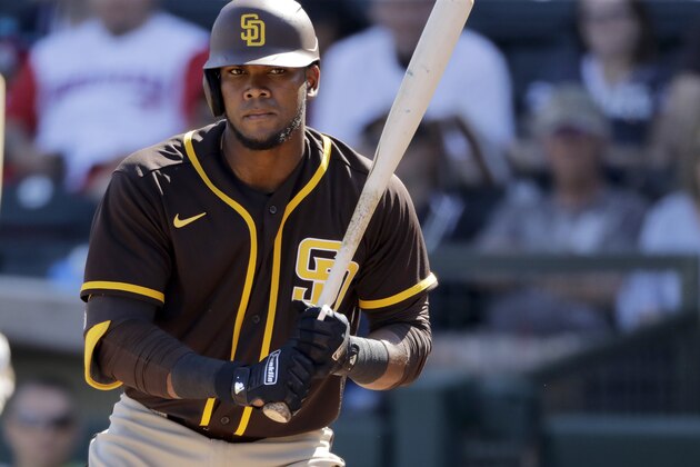 San Diego Padres' Franchy Cordero bats during the second inning of a spring training baseball game against the Kansas City Royals Monday, Feb. 24, 2020, in Surprise, Ariz. (AP Photo/Charlie Riedel)