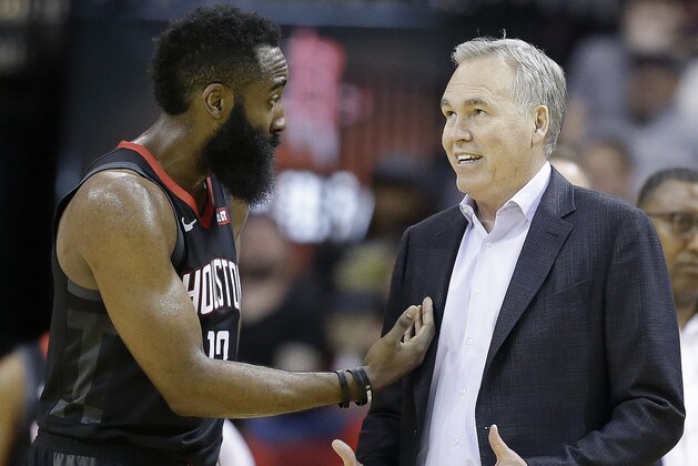 Houston Rockets guard James Harden (13) and head coach Mike D'Antoni talk during a timeout during the second half of an NBA basketball game against the Atlanta Hawks, Monday, Feb. 25, 2019, in Houston. (AP Photo/Eric Christian Smith)