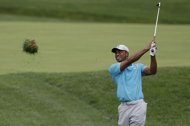 Tiger Woods hits toward the sixth green during the first round of the Memorial golf tournament, Thursday, July 16, 2020, in Dublin, Ohio. (AP Photo/Darron Cummings)