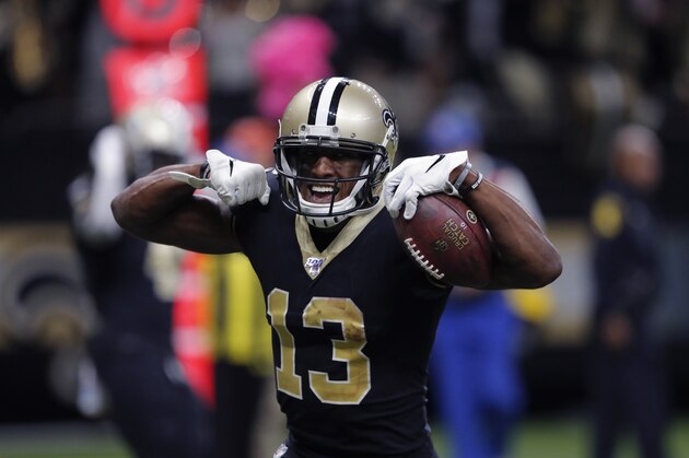 New Orleans Saints wide receiver Michael Thomas (13) celebrates his touchdown in the second half of an NFL football game against the Tampa Bay Buccaneers in New Orleans, Sunday, Oct. 6, 2019. (AP Photo/Bill Feig)