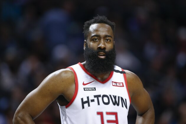 Houston Rockets guard James Harden stands on the court during a break in the action against the Charlotte Hornets during the second half of an NBA basketball game in Charlotte, N.C., Saturday, March 7, 2020. Charlotte won 108-99. (AP Photo/Nell Redmond)
