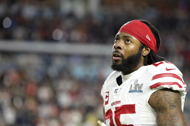 San Francisco 49ers cornerback Richard Sherman (25) looks at the scoreboard late in a game against the Kansas City Chiefs at Super Bowl 54 on Feb. 2, 2020, in Miami Gardens, Fla. The Chiefs won the game 31-20. (AP Photo/Gregory Payan)