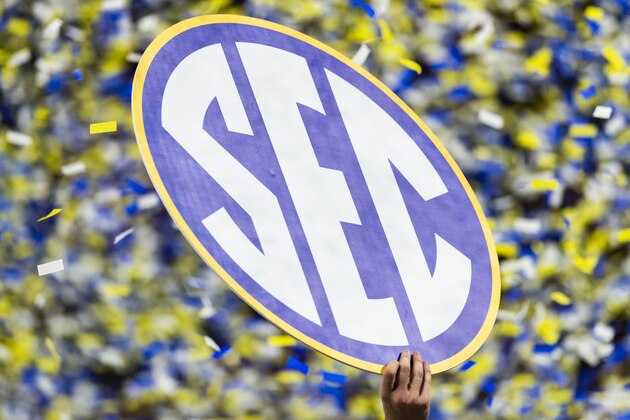SEC sign held up by a player after the Southeastern Conference Championship NCAA college football game against the Alabama Crimson Tide and the Georgia Bulldogs on Saturday, Dec. 1, 2018 in Atlanta. (Ric Tapia via AP)