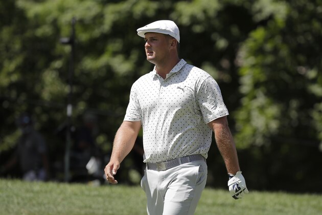 Bryson DeChambeau walks down the ninth fairway during the second round of the Memorial golf tournament, Friday, July 17, 2020, in Dublin, Ohio. (AP Photo/Darron Cummings)