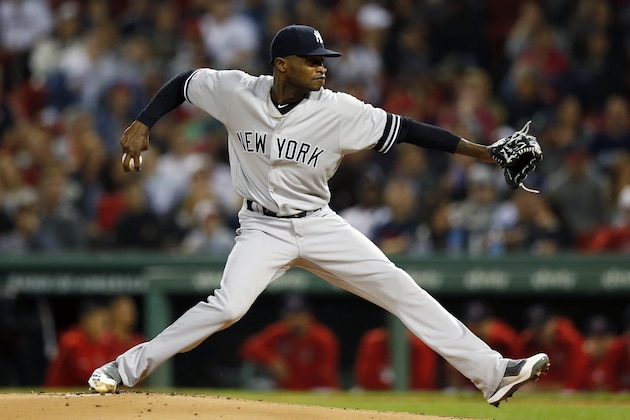 FILE - In this Sept. 6, 2019, file photo, New York Yankees' Domingo German pitches during the first inning of the team's baseball game against the Boston Red Sox, in Boston.  Yankees pitcher Domingo German will miss the first 63 games of the 2020 season as part of an 81-game ban for violating Major League Baseballâ€™s domestic violence policy. The league announced the suspension Thursday, Jan. 2, 2020. German has agreed not to appeal. (AP Photo/Michael Dwyer, File)
