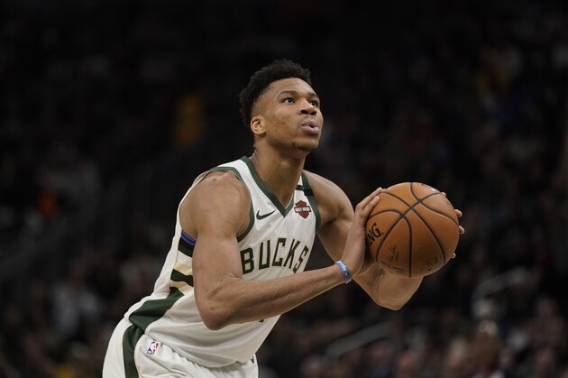 Milwaukee Bucks' Giannis Antetokounmpo shoots during the second half of an NBA basketball game against the Indiana Pacers Wednesday, March 4, 2020, in Milwaukee. The Bucks won 119-100. (AP Photo/Morry Gash)