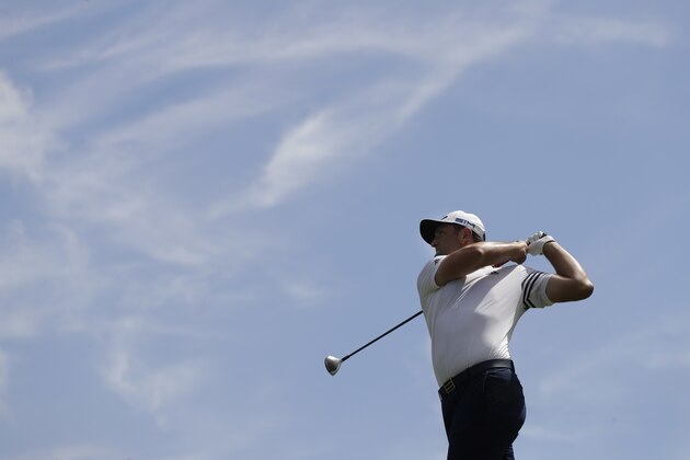 Jon Rahm, of Spain, hits from the fifth tee during the second round of the Memorial golf tournament, Friday, July 17, 2020, in Dublin, Ohio. (AP Photo/Darron Cummings) Jon Rahm, of Spain, hits from the fifth tee during the second round of the Memorial golf tournament, Friday, July 17, 2020, in Dublin, Ohio. (AP Photo/Darron Cummings)