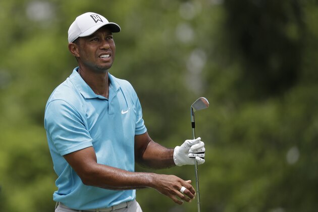 Tiger Woods watches his shot from the third tee during the first round of the Memorial golf tournament, Thursday, July 16, 2020, in Dublin, Ohio. (AP Photo/Darron Cummings)