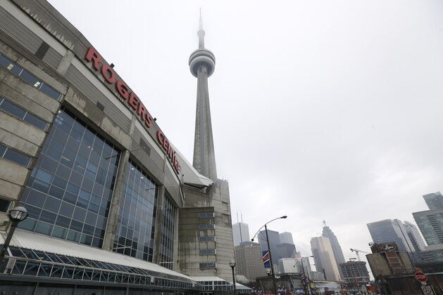 The Rogers Centre and the CN Tower before an NFL football game between the Buffalo Bills and the Seattle Seahawks on Sunday, Dec. 16, 2012, in Toronto. (AP Photo/Mike Groll)