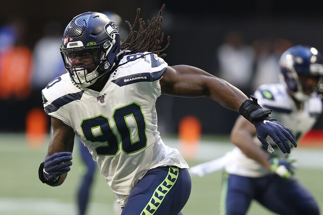Seattle Seahawks defensive end Jadeveon Clowney (90) breaks off the line of scrimmage in a week 7 NFL football game against the Atlanta Falcons, Sunday, Sep. 27, 2019 in Atlanta. (Michael Zarrilli/AP Images for Panini, via AP)