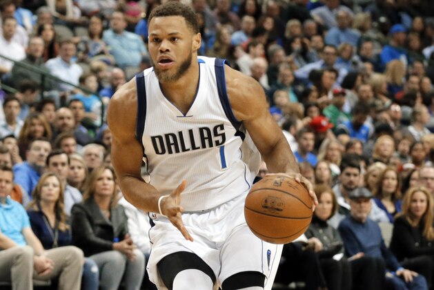 Dallas Mavericks' Justin Anderson (1) handles the ball during an NBA basketball game against the Brooklyn Nets on Friday, Jan. 29, 2016, in Dallas. (AP Photo/Tony Gutierrez)